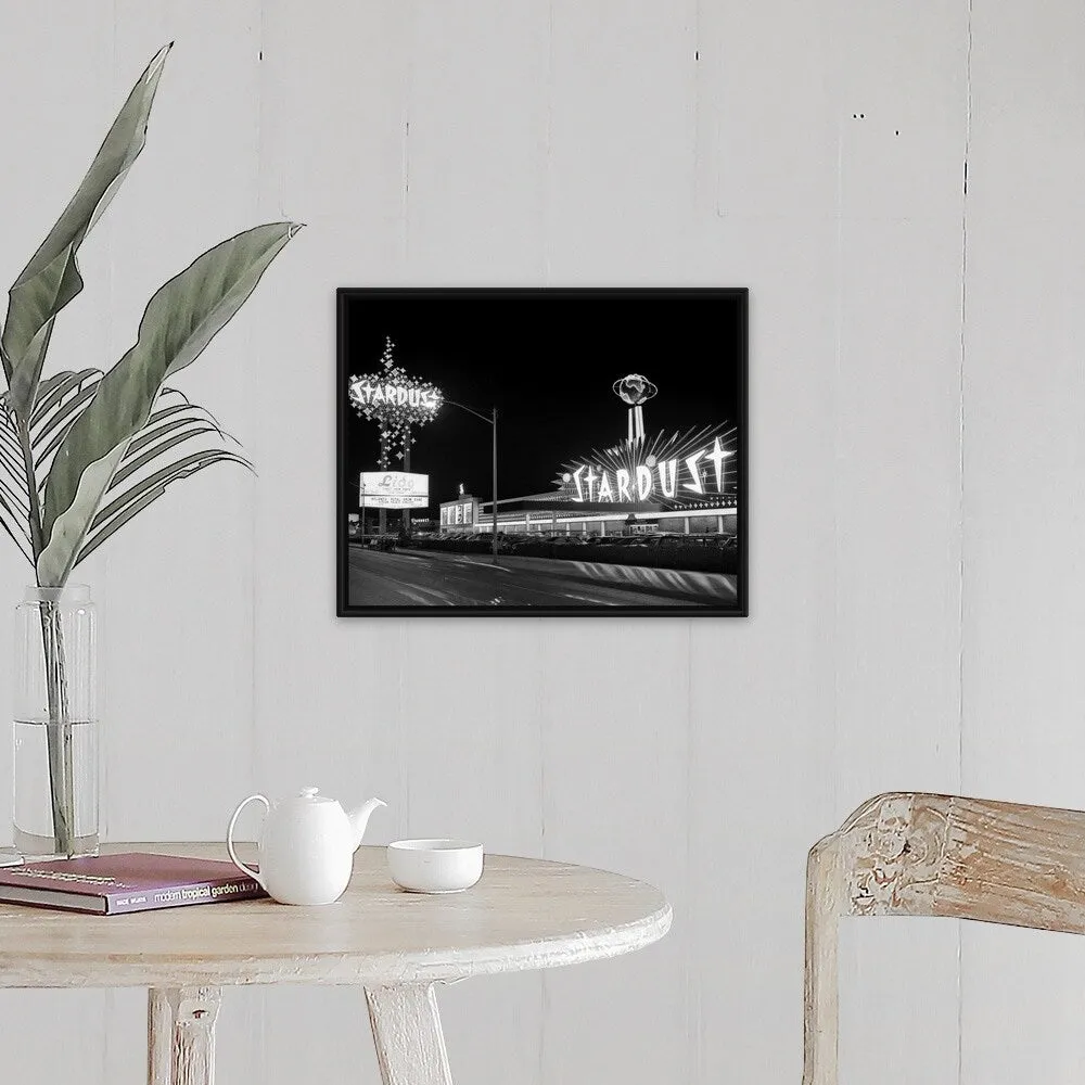 "1960's Night Scene Of The Stardust Casino Las Vegas Nevada USA" Black Float Frame Canvas Art